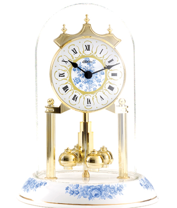 Pendule 400 jours Quartz balancier boules dorées, Socle porcelaine - ht. 23cm